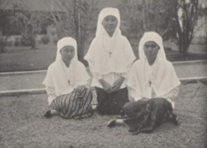 Image of three girls, including Maria Cecile Soetilah (later, sister Xaveria Pantjawidagda O.S.U.) one of the first Javanese women to enter the religious order of the Ursulines of the Roman Union in the Dutch East Indies in the 1930s